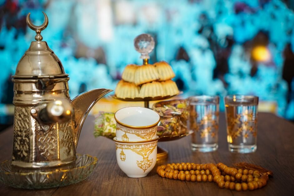 Elegant Arabian tea setup with sweets, showcasing traditional culture indoors.